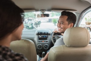 Asian,Male,Taxi,Driver,Welcoming,His,Customer