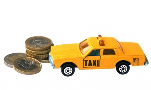 Taxi,Toy,And,Euro,Coins,Isolated